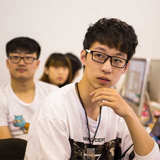 Young male student in classroom NZSE