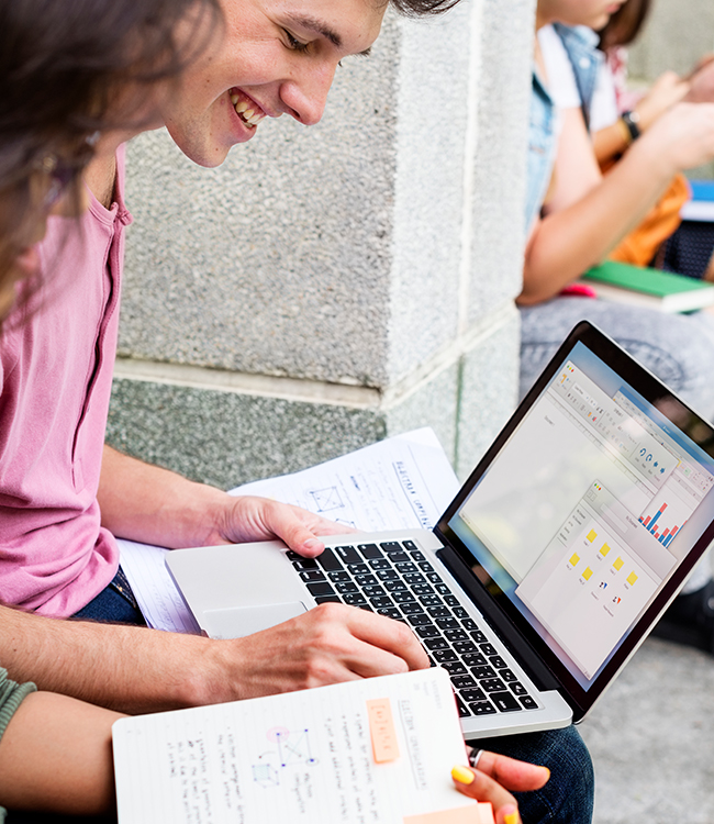 Student working on laptop NZSE