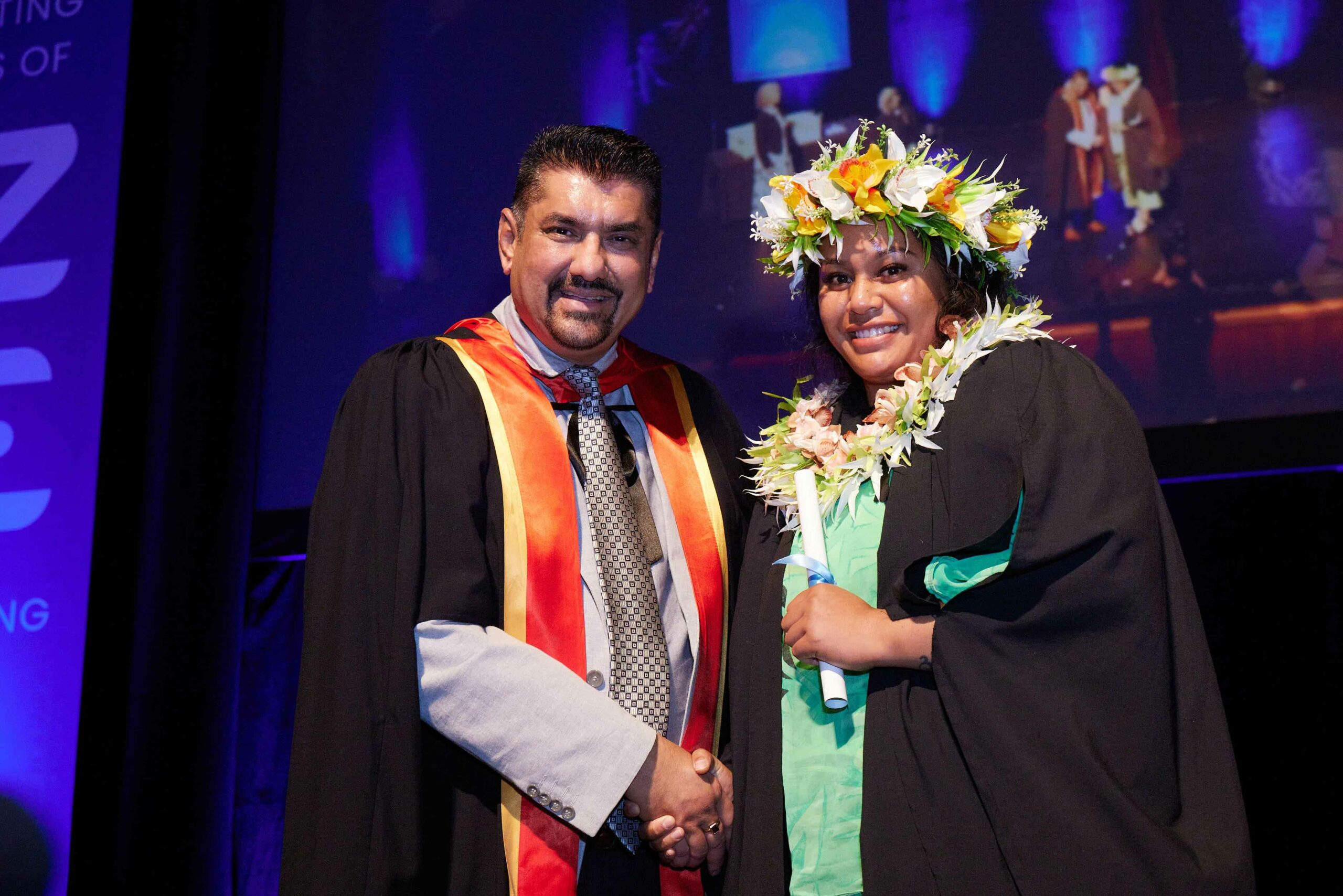 Graduate and Tutor at Graduation Ceremony 2024 NZSE