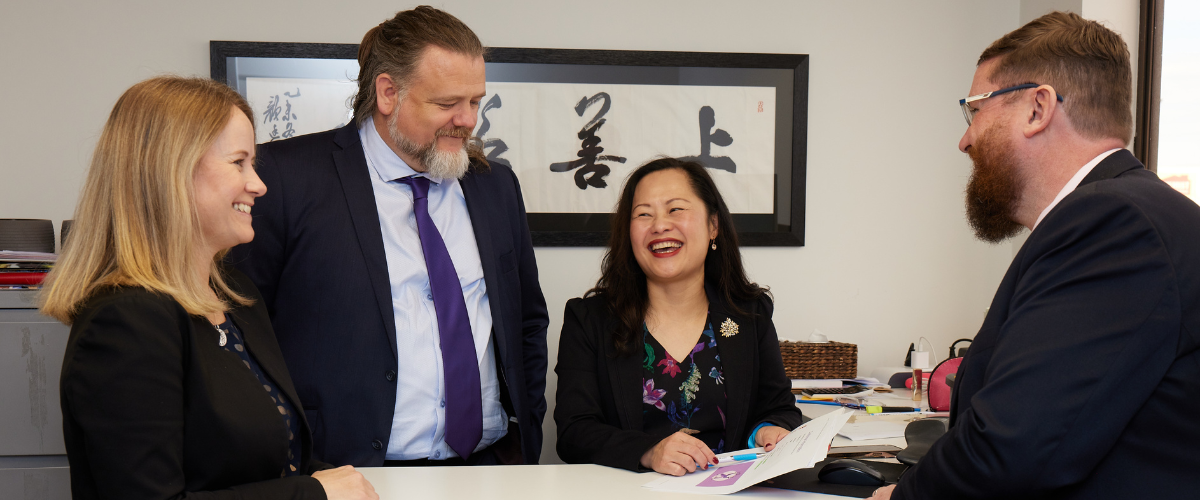 Group of staff conversating