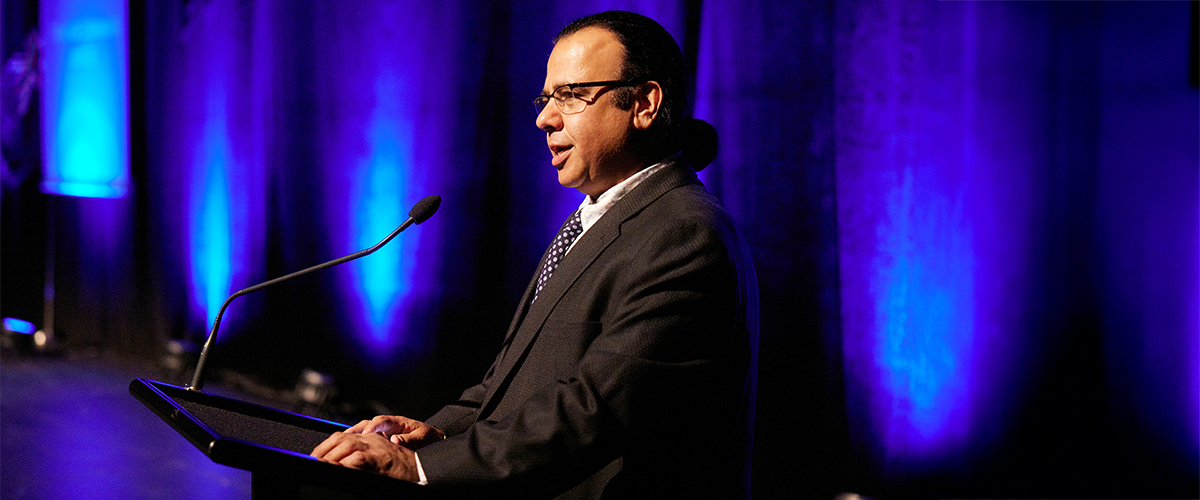 Man presenting on stage NZSE